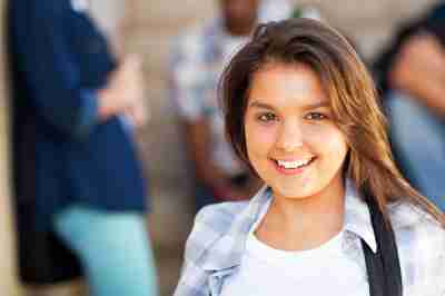Girl smiling facing camera